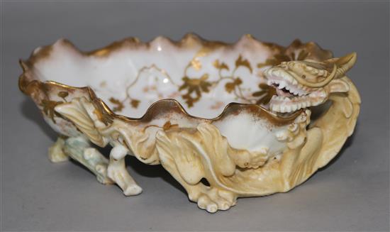 A Doulton Burslem porcelain dish, decorated with a dragon, 7in.
